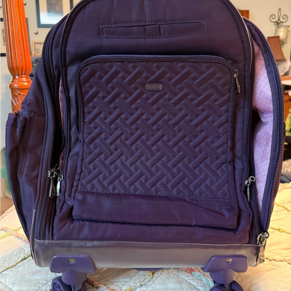 Lug purple rolling backpack